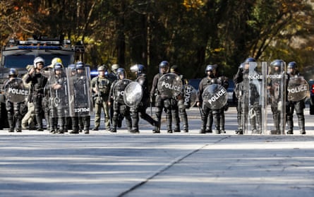 Atlanta police officers in riot gear gathered in response to demonstrators protesting Cop City.