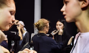 Models getting ready at Paris fashion week.