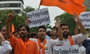 Demonstrators protest against Amnesty’s involvement in an event held in disputed Indian Kashmir, which led to sedition charges against the NGO. 