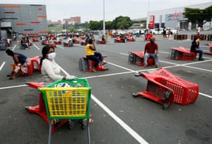 Chatsworth, South Africa: shoppers queue at a grocery store in a township in South Durban during the lockdown