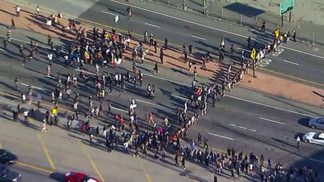 George Floyd: aerial footage shows protesters block LA highway – video