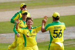 Zampa celebrates the wicket of Morgan.