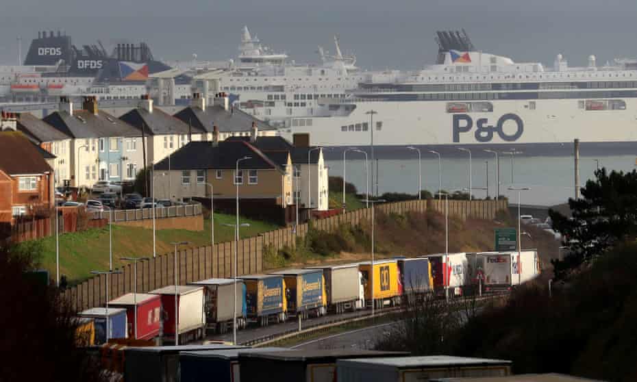 Lorries queue along the A20 in Dover to board ferries to mainland Europe. 