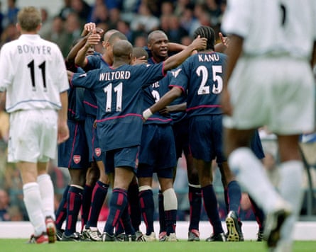 Arsenal players celebrate Kanu’s opening goal in their match against Leeds United in September 2002.