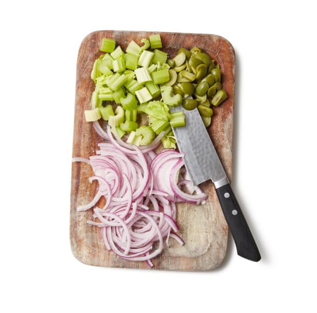 Felicity Cloake’s caponata: we’re chopping celery and onion here.