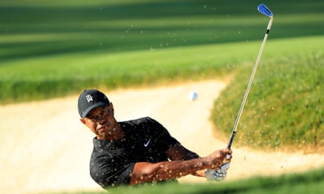Tiger Woods plays from a bunker during a practice round prior to the Memorial Tournament at Muirfield Village in Ohio.