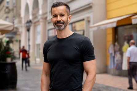 Tamás standing in the street