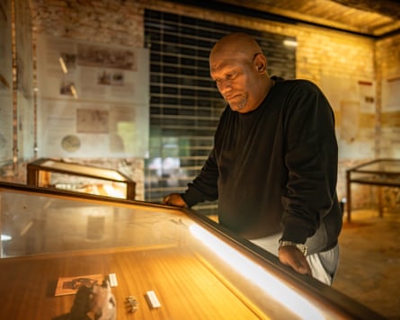 Nico Jansen, estate manager of Solms-Delta wine farm, looks at artefacts in the farm’s museum in Franschhoek, South Africa