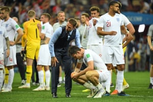 Gareth Southgate comforts Harry Maguire after England’s defeat in the 2018 World Cup semi-final.