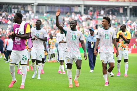 Sadio Mane of Senegal (centre) and teammates applaud their supporters after winning their World Cup 2026 group game against Iraq.