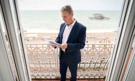 Labour leader Keir Starmer prepares his conference speech on a balcony in Brighton