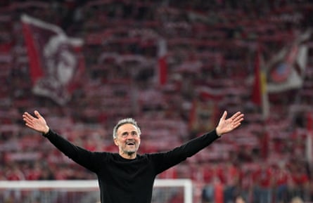 Luis Enrique hails the travelling fans after the match