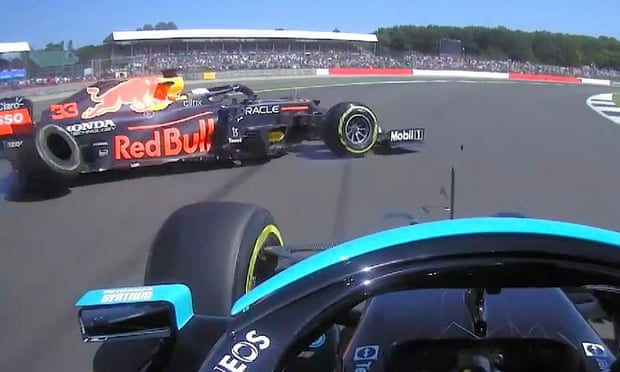 Lewis Hamilton and Max Verstappen collide on Copse corner.