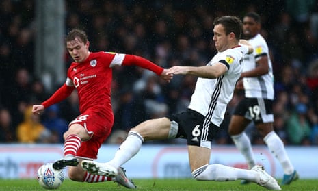 Kevin McDonald (centre, No 6) in action for Fulham against Barnsley last season.