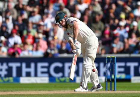 Mitchell Marsh hits the runs that take him past his half century.