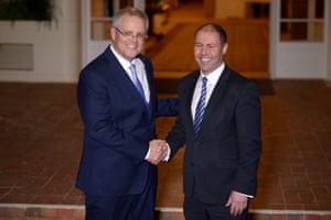 Scott Morrison and Josh Frydenberg shake hands