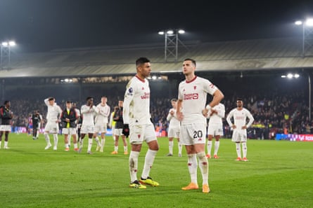 Manchester United’s Casemiro (left) and Diogo Dalot look shellshocked after the 4-0 defeat by Crystal Palace
