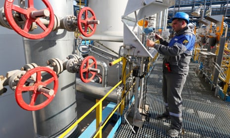 A worker checks measuring equipment at the Slavyanskaya compressor station operated by Gazprom, the starting point of the Nord Stream 2 pipeline