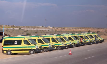 Ambulances are seen at the Rafah border crossing between Egypt and the Gaza Strip.