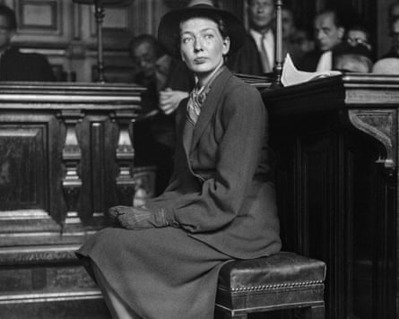 A black and white photograph of Corinne Luchaire, sitting in court during her Paris trial for her association with Germans during the occupation of France, 1946