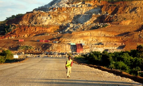 A Malagasy worker walks along an access track near the site of Rio Tinto's Fort Dauphin mine.