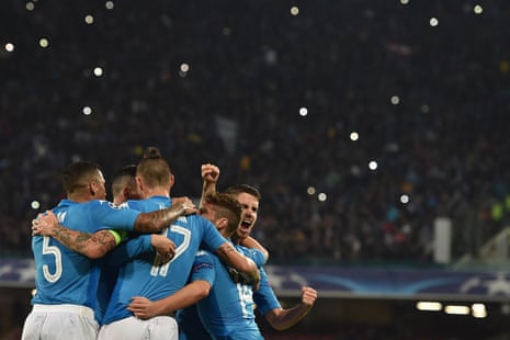 Jorginho is congratulated by his team-mates after his penalty put  Napoli back on level terms.