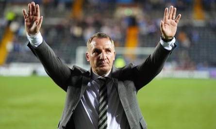 Brendan Rodgers waves to the travelling fans at Rugby Park