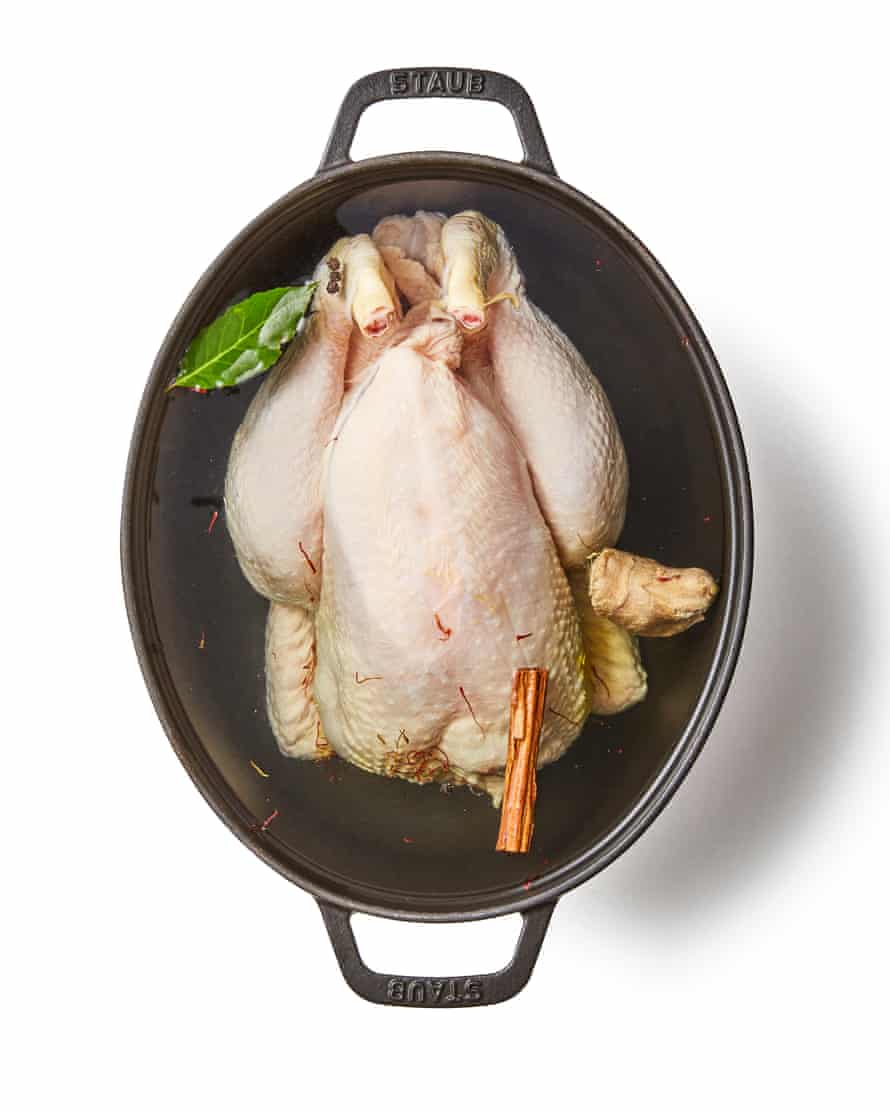 Felicity Cloake’s Coronation chicken 2b Put the bird breast side up in a large saucepan with the cinnamon, peppercorns, saffron, salt, bay leaf and half the ginger, sliced. Fill the pan with cold water until only the top of the breast is exposed. If you don’t have a pan large enough, break the chicken down into joints, or indeed use two breasts SKIN ON?, two whole legs (or two thighs and two drumsticks) and two wings.