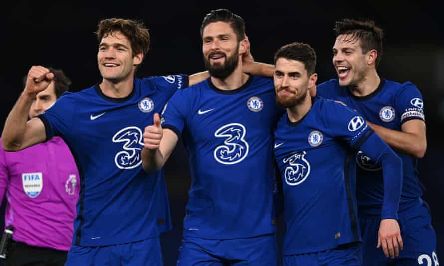 Olivier Giroud of Chelsea celebrates after scoring his sides first goal with Marcos Alonso (left), Jorginho and Cesar Azpilicueta of Chelsea (right).