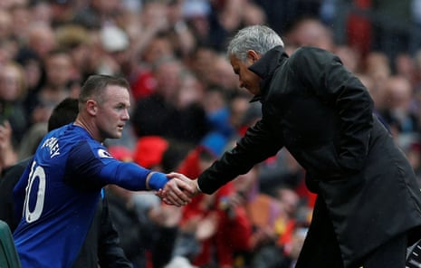 Mourinho shakes hands with Rooney.
