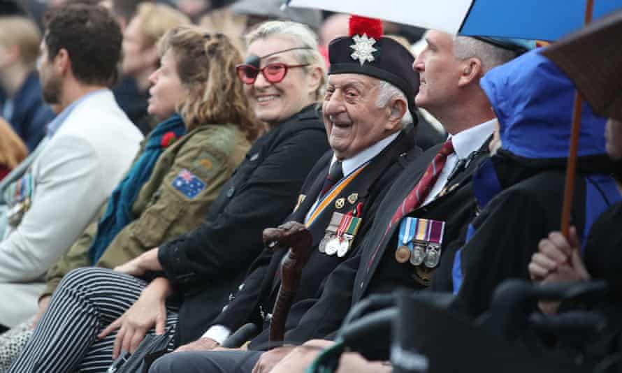 People attend the dawn service at Currumbin, during Anzac Day in Gold Coast, Monday, April 25, 2022.