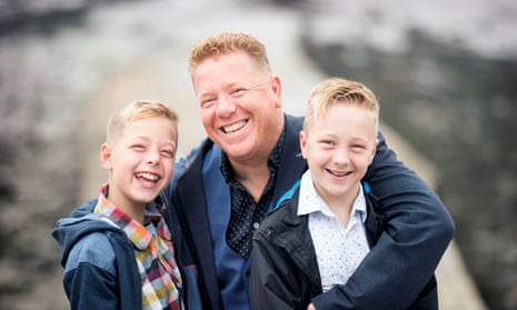 St John (Singe) Greene with his sons Finn, 10, and Reef (right), 12, who survived cancer after his wife Kate had died of breast cancer.
