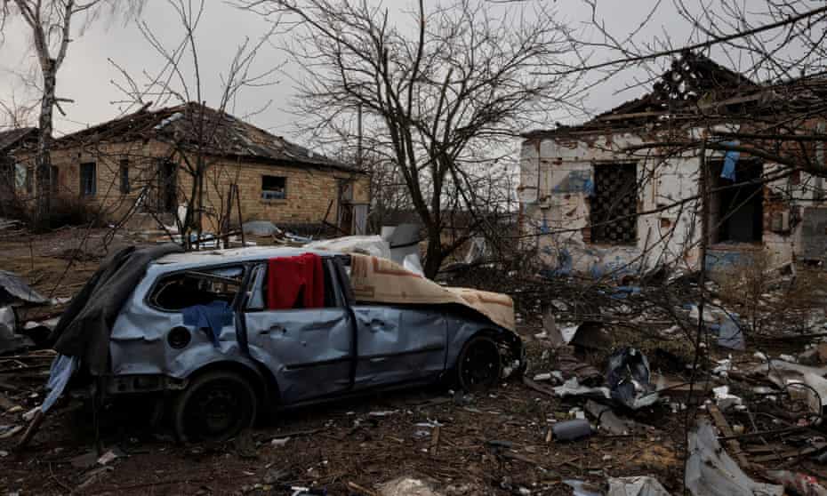 Damaged houses in a village outside Kyiv