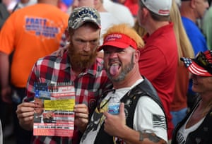 Trump supporters await the arrival of their hero.
