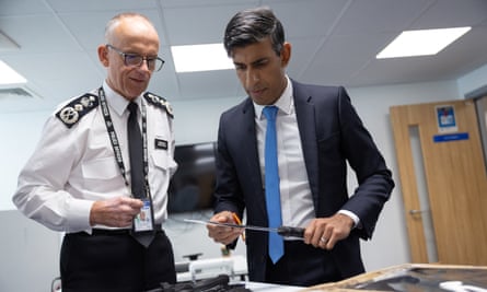 The prime minister visits Kilburn police station in London with Metropolitan police commissioner Mark Rowley on 30 August 2023.