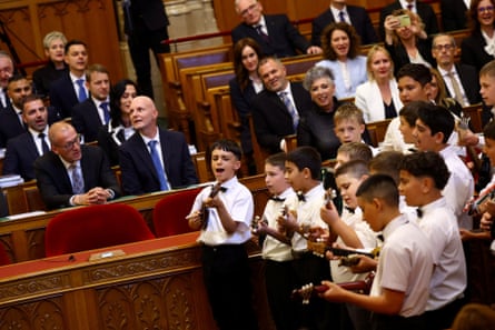 The Sükösd Roma Child Choir perform the Zöld az erdő at the inaugural session of the new parliament.
