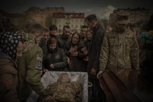 Essay, highly commended - Oksana mourning her Ukrainian army volunteer son Oleh Skybyk, 27, at his funeral at Lychakiv cemetery on 28 April 2022 in Lviv. He is survived by his wife and two children, aged three and one