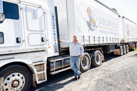 Jon Lockwood standing next to a truck with a Goldfields logo