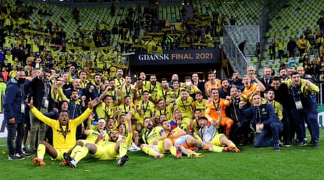 The Villarreal players and staff celebrate in front ot their joyous fans.
