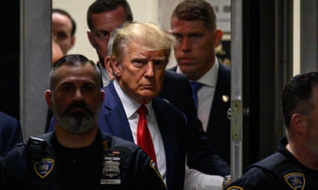 Donald Trump makes his way inside the Manhattan criminal courthouse in New York on 4 April 2023, where he became the first former US president to be criminally indicted.