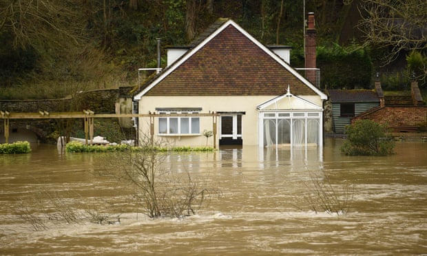 A house in flood water in Ironbridge, Shropshire, last year. In 2019, the CCC warned that the UK had no proper plans for protecting people from flash flooding. 