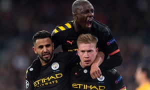 Kevin De Bruyne celebrates with Riyad Mahrez and Benjamin Mendy