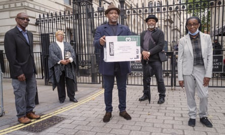 From left to right: Michael Braithewaite, Glenda Caesar, Anthony Bryan, Elwardo Romeo and Paulette Wilson presented a petition to Downing Street on 19 June, demanding full compensation for the victims.