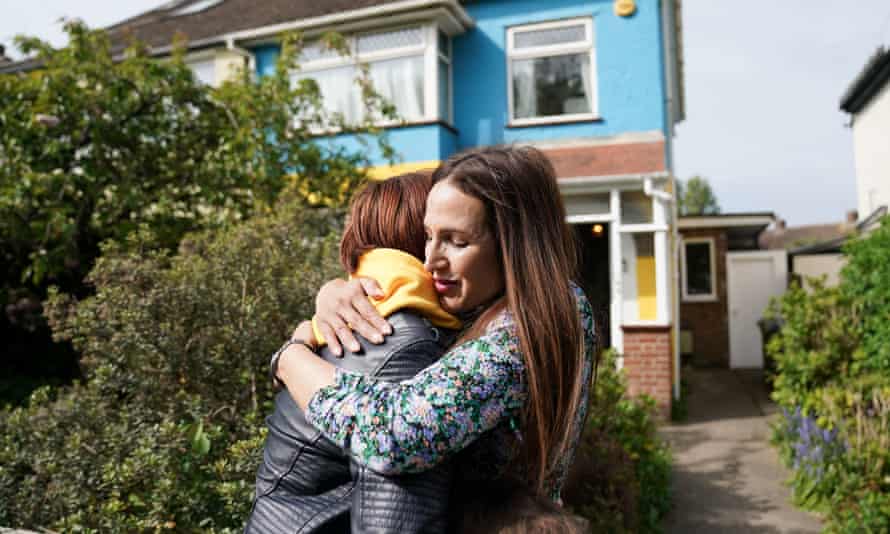Rend Platings (right) embraces her Ukrainian best friend Kristina Korniiuk as they are reunited outside her home in Cambridge.