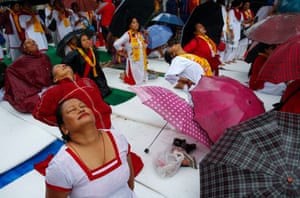 Kathmandu, Nepal Despite the rain, Nepal’s prime minister and hundreds of yoga practitioners participated in a mass yoga event