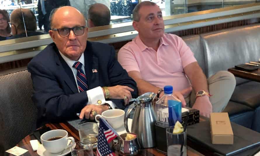 Rudy Giuliani and Lev Parnas have coffee at the Trump International hotel in Washington DC, on 20 September.