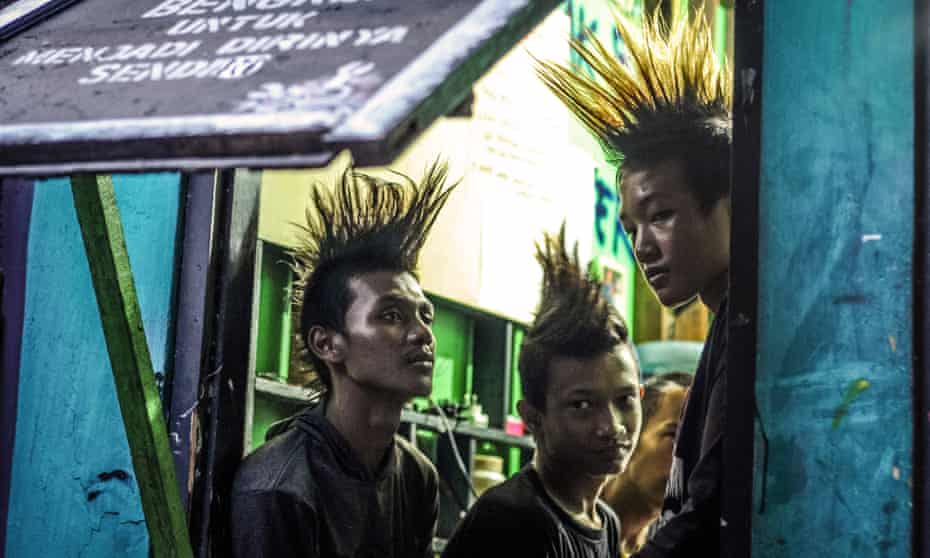 Marjinal Punk Community members protest against the arrest of 65 punk rock fans who were forced by police to have their hair cut.