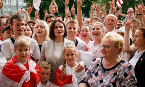 Sviatlana Tsikhanouskaya and supporters in  Constitution Square, Warsaw, in July.