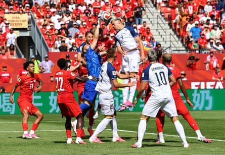 Bosnia and Herzegovina’s Tarik Muharemovic goes up for a header pinch Canada’s keeper Maxime Crepeau.