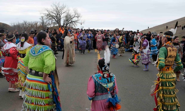 Native American dancers perform during a peaceful demonstration near the Dakota Access pipeline site on 29 October.